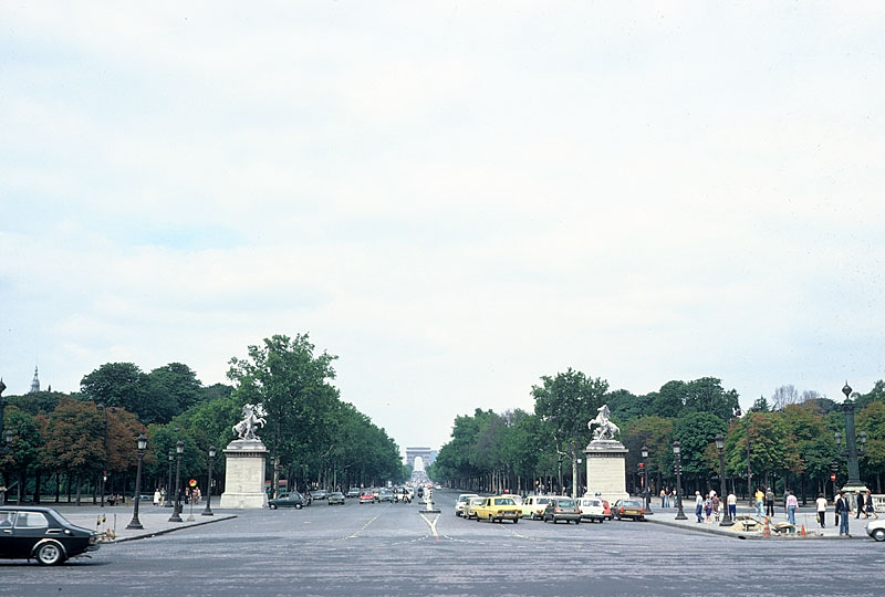 Entrance to Champs-Élysées with Arc of Triumph on
  Horizon